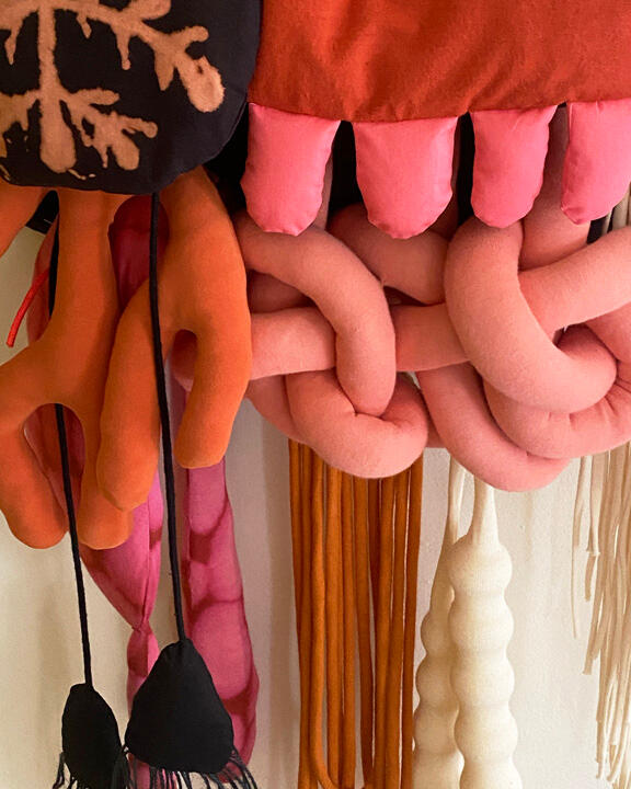 Human Nature - 2024 colorful fabric sculpture titled, Human Nature, by Tamara Bagnell